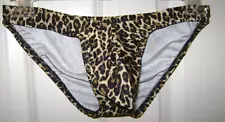 A New sexy, Leopard print, swim / poser bikini un- branded, Spandex, Made in USA