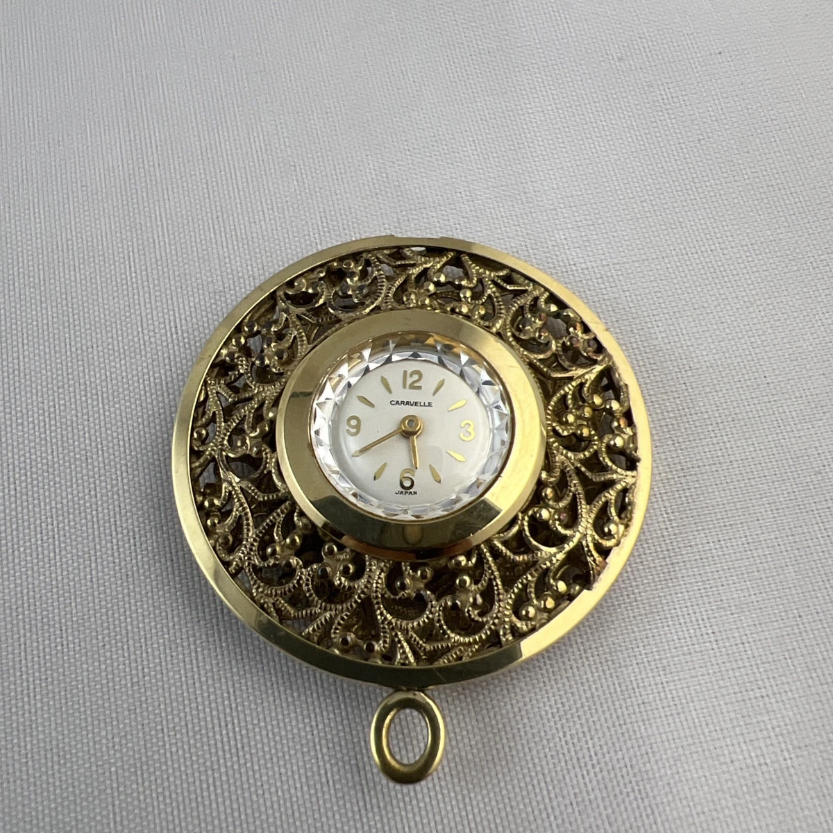 Vintage Caravelle Hand Wind Analog 31mm Round Pendant Watch (H428) Vintage Caravelle Pendant Watch: Brocaded Gold Tone Diamond  main image 4