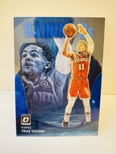 TRAE YOUNG 2022-23 Panini Donruss Optic - Raining 3s #8 Blue Prizm /49