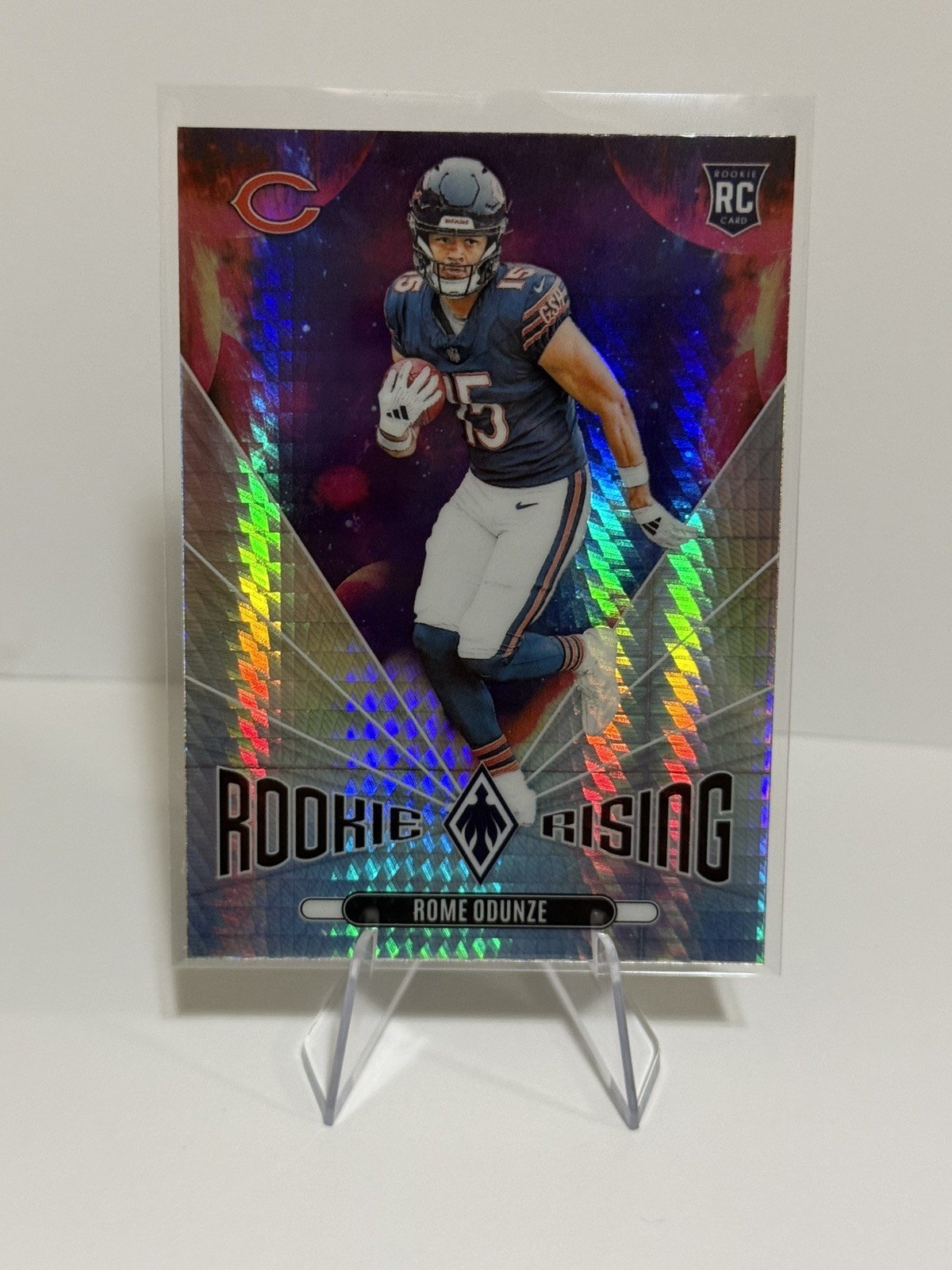 2024 Panini Phoenix - Rookie Rising Rome Odunze Bears #RR-ROE Hyper (RC)