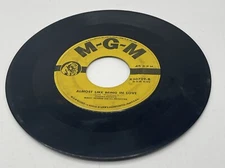 Woody Herman And His Orchestra ALMOST LIKE BEING IN LOVE/I CAN’T BELIEVE, 45RPM