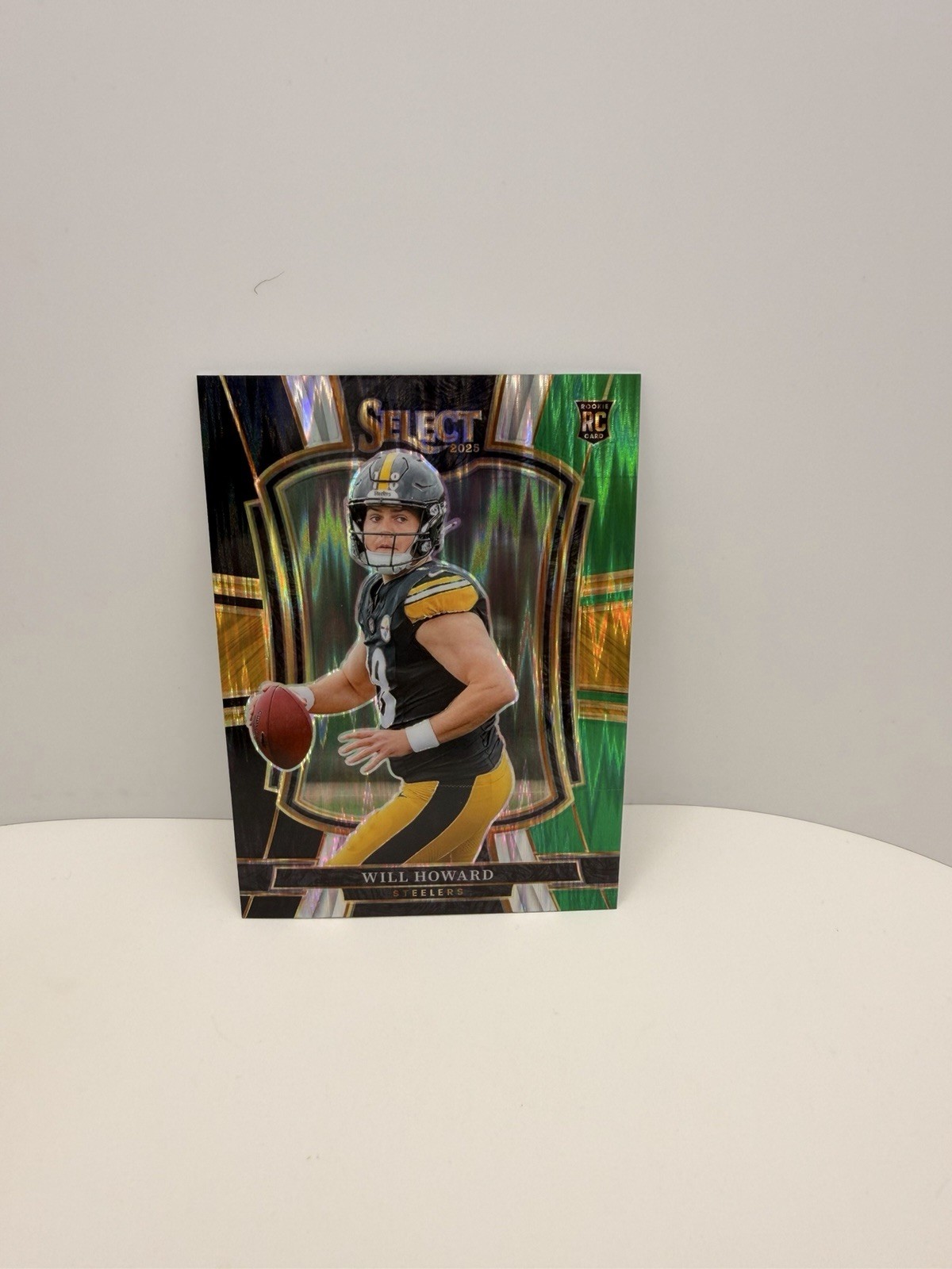 2025 Panini Select - Premier Level Will Howard #152 Black & Green Shock Prizm RC