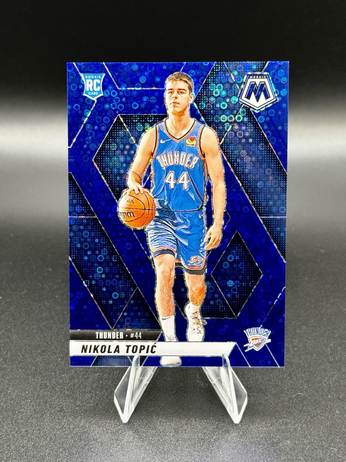 2024-25 Panini Mosaic - Nikola Topic /85 Blue Disco #242 (RC)