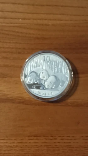 2013-Silver Panda Uncirculated In Mint Capsule