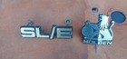 Holden VH Commodore Grille Badges Lot – SLE & Centre – Original OEM