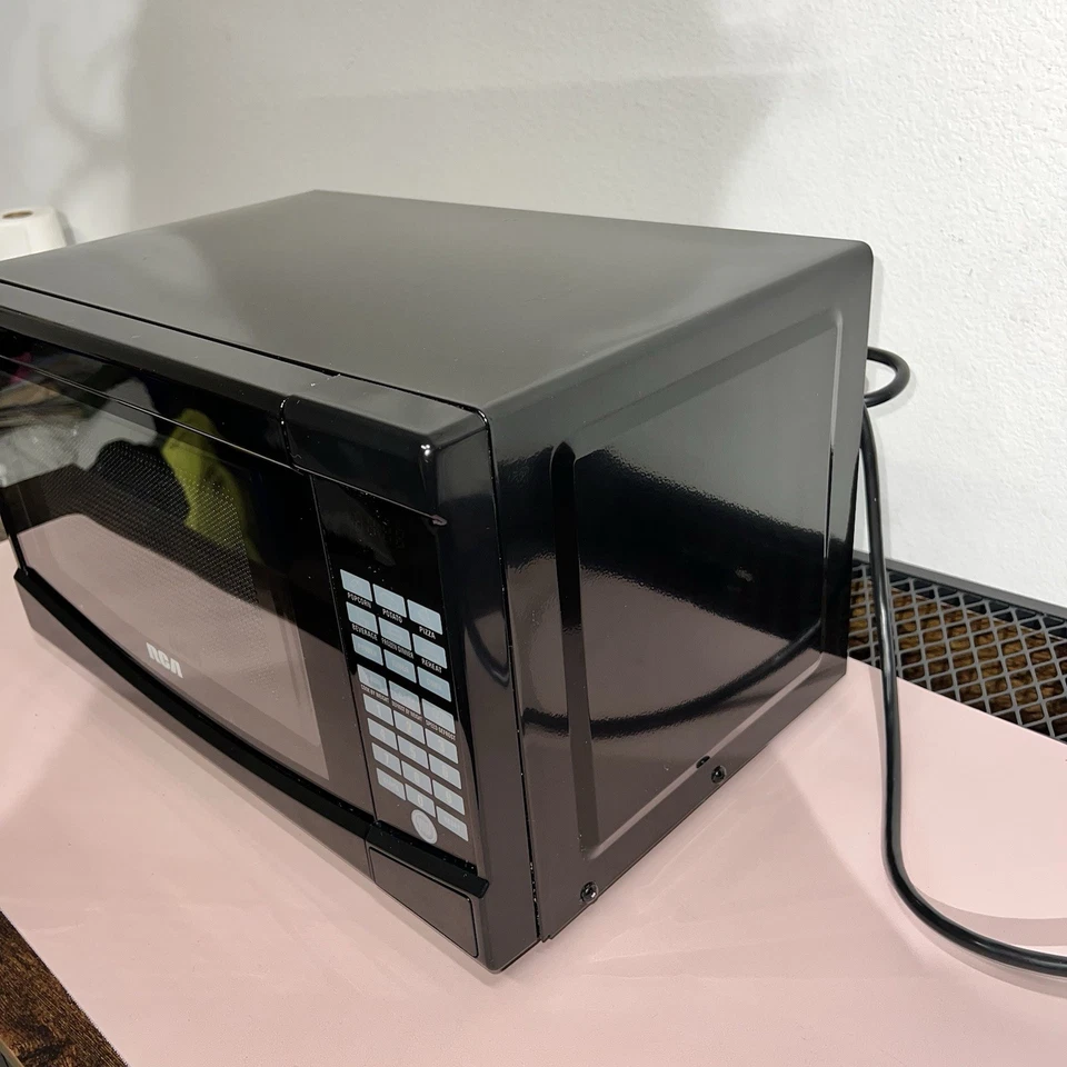 Microondas de encimera 0,7 cúbicos Ft. En negro RCA 700 vatios con caja excelente estado Foto 2 de 4