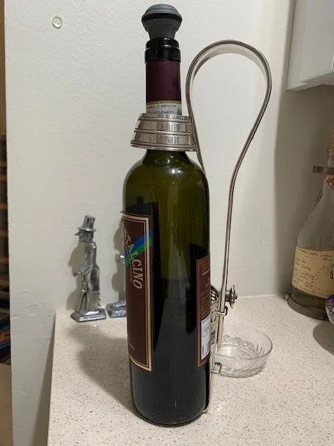 Antique wine bottle holder pourer