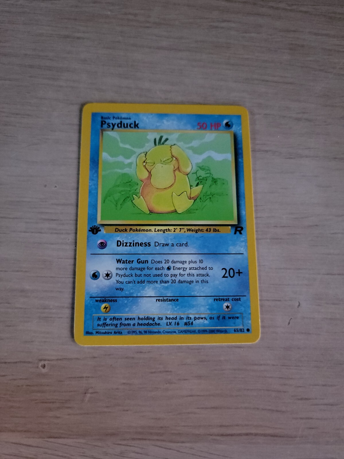 Pokémon Team Rocket 1st Edition Regular Finish Psyduck 65/82 NM-MT OC213