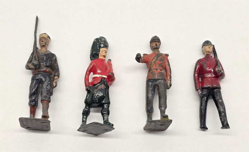 4 Cast lead Military figures  -  2- Britain's Ltd Proprietor Made in England