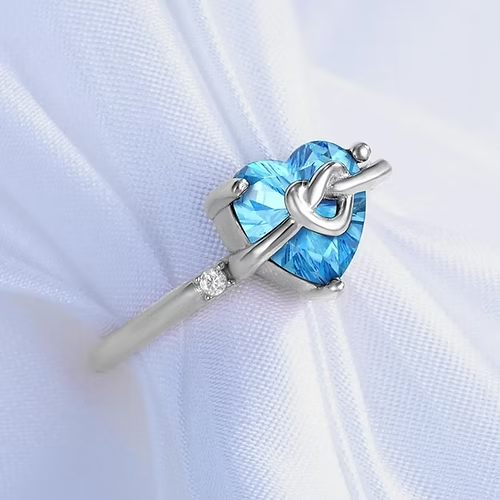 Anello donna nodo cuore in argento sterling 925 con zircone blu al centro - Foto 2 di 5