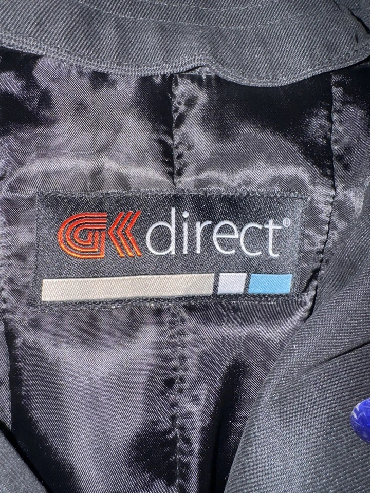 Gabardina impermeable negra Gk Direct con capucha extraíble. Talla 4 para mujer. Foto 3 de 4