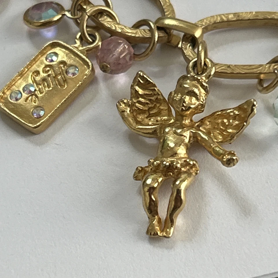 Vintage Kirks Folly Gold Charm Bracelet CHERUBS with Flowers and Butterflies - Image 3 of 4