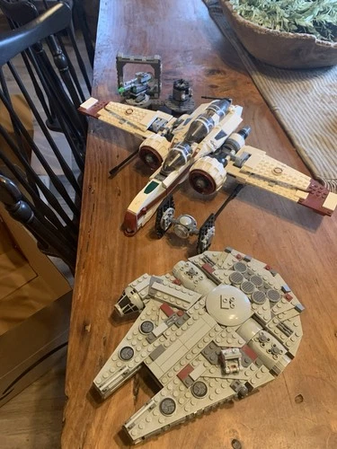4 Sets Of Lego Star Wars Including A Tie Fighter, X Wing, And Millennium Falcon