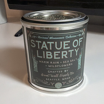 Good+Well Supply Co. Statue of Liberty Scented Tin Candle Warm Rain Sea Salt