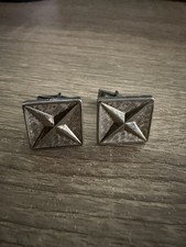 Boutons de manchette anciens en métal ton argent