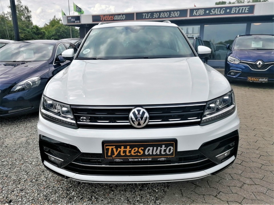 Tiguan 220 л с