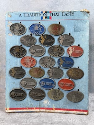1984 Olympic Games Belt Buckle Display Complete 24 Sanchez International RARE