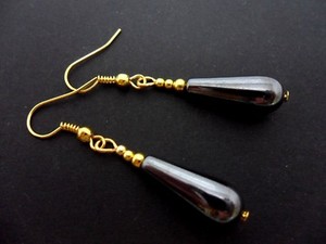 Authentic A PAIR OF GOLD PLATED DANGLY HEMATITE TEARDROP EARRINGS. .