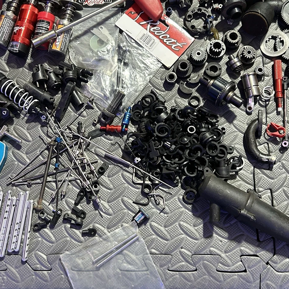 RC Nitro Tmaxx Clutch Bells Exhaust HPI Savage Roto Start Glow Plugs Parts Lot - Image 4 of 4