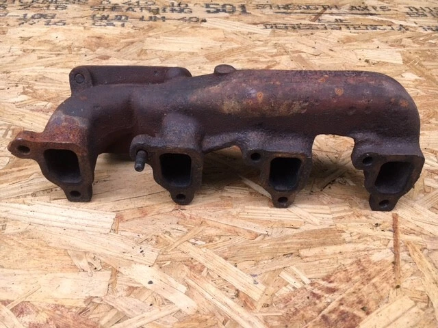 Colector de escape y carcasa turbo Mopar Vintage OEM 1985 Dodge Omni Turbo I Foto 3 de 4