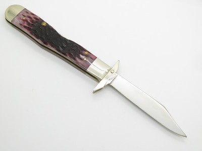 2002 Case XX 6111 1/2 Cheetah Silver Script Cranberry Bone Folding