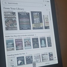 Amazon Kindle Colorsoft 7 inch screen bundle, with cover and wall plug.