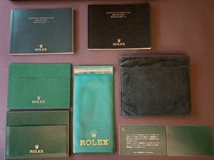 Rolex vintage accessory lot of 8 booklets card sleeves service pouches Japan/Ger
