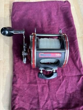 penn 113h special 4/0 senator with Clamp mount , excellent condition