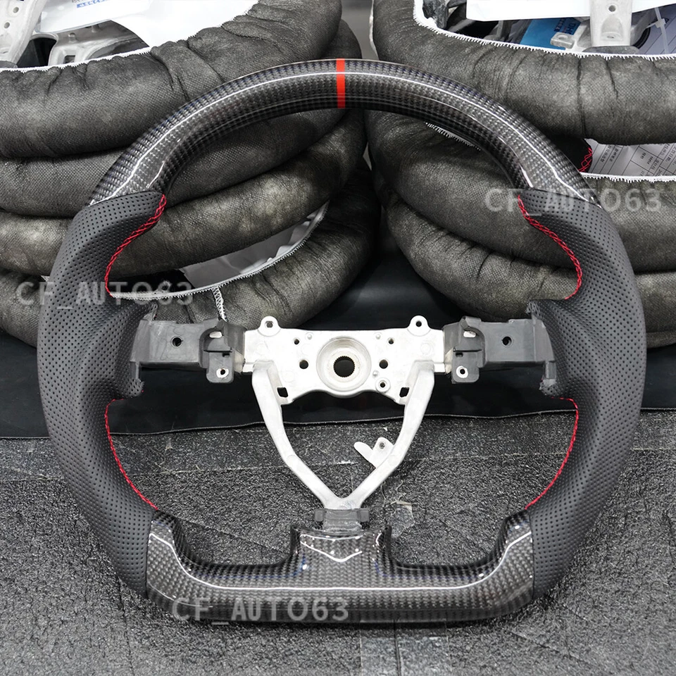 Volante plano de cuero perforado de fibra de carbono para Toyota FJ Cruiser 07-14 Foto 2 de 4