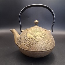 Tetera japonesa de hierro fundido Tetsubin diseño de pájaro marca de fabricante de tetera forrada en esmalte