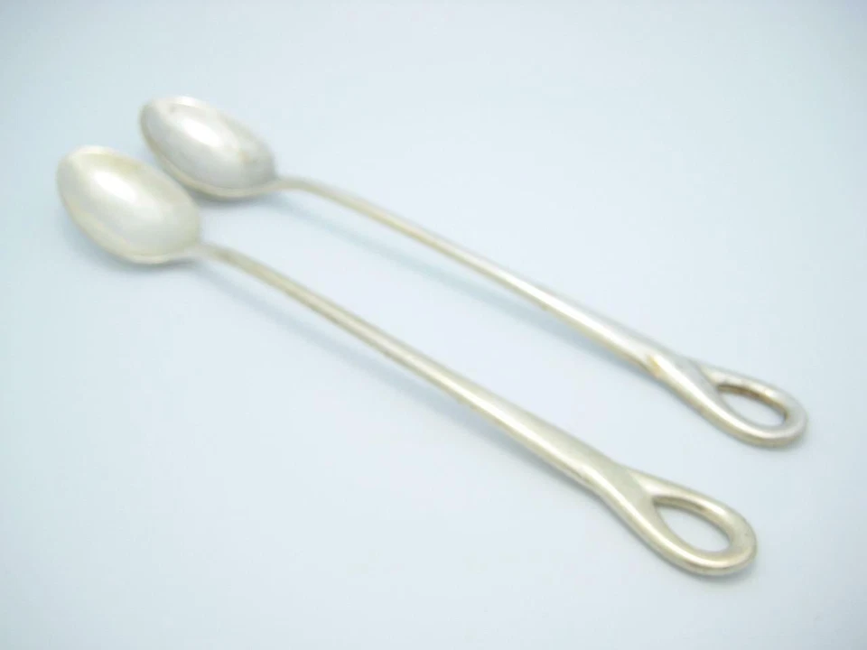 Juego de dos cucharas Tiffany & Co. de plata esterlina Peretti Padua bolsa de 6,25" - A Foto 2 de 4