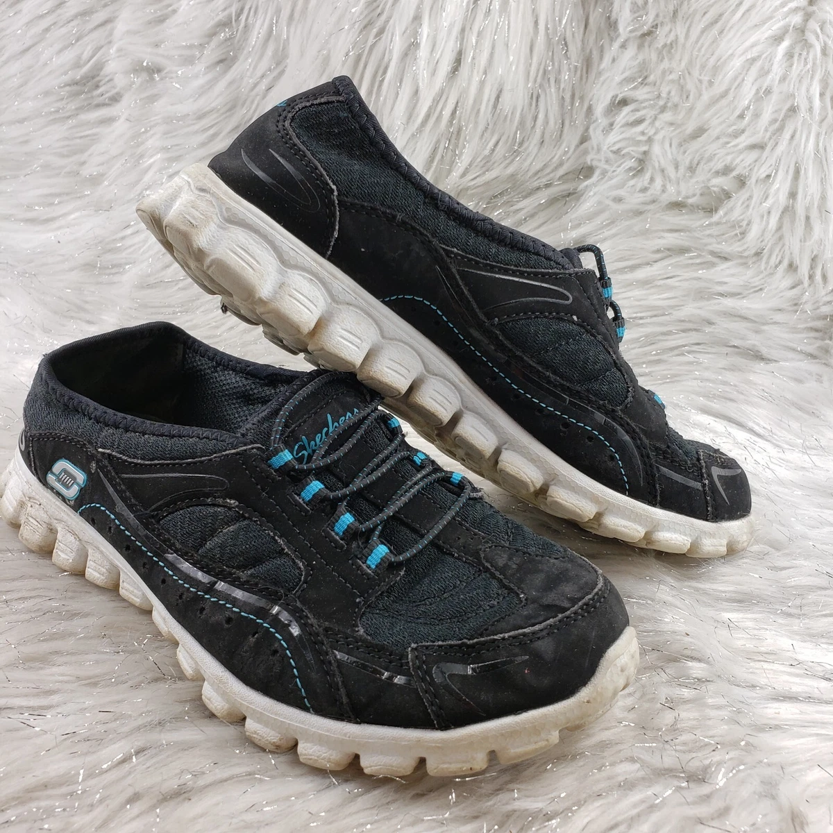 Ladies black deals skechers size 6