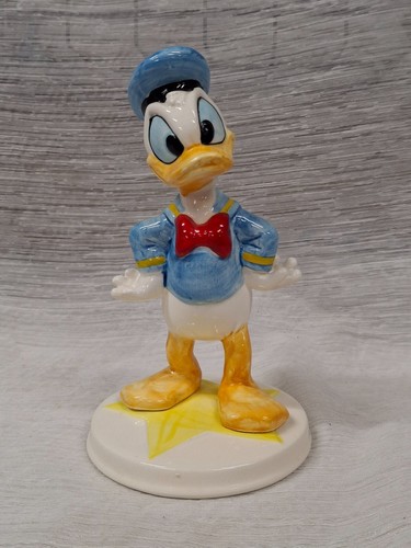 Schmid Walt Disney Co. Donald Duck on Star Figurine - 7" Tall