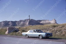 sl63 Original Slide 1970's  Scotts Bluff Ntl Monument car Monterey ? 692a