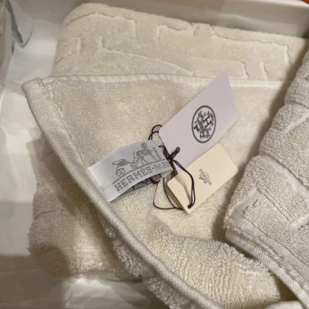 Hermes face online towel