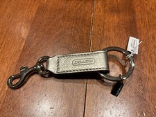 NWT Coach Pewter/SilverTrigger snap Turn Lock Leather Keychain/Keyring 65816