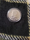 1973 D MINT Kennedy Half Dollar.