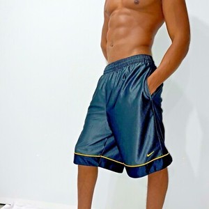 black and yellow nike basketball shorts