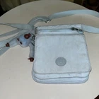 Kipling Eldorado Adjustable Strap Crossbody Purse with Monkey Charm -baby blue