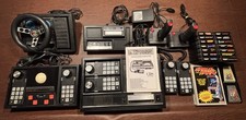 coleco vision w/3 expansion modules, games and extra controllers
