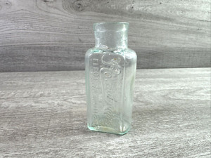 Small Antique Rountree's Elect Lemonade Aqua Bottle 4"