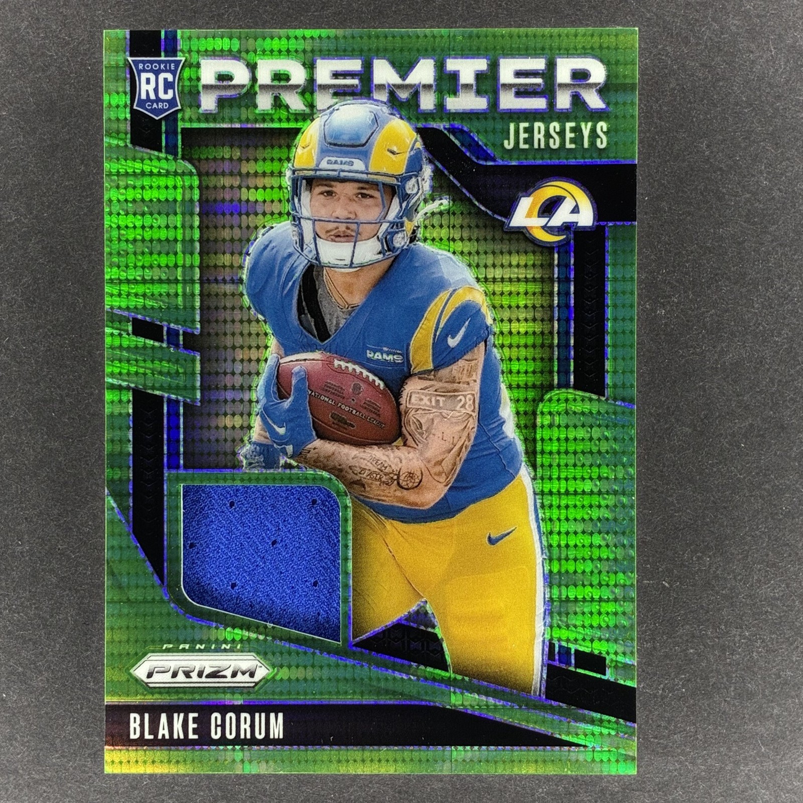2024 Panini Prizm Blake Corum #PJ-BCM Premier Jersey Patch Green Pulsar Prizm RC