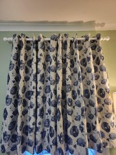Good quality lined eyelet curtains. 54" long x 64" wide, excellent condition