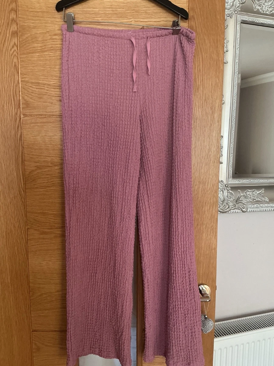Pantalón elástico rosa H&M talla M