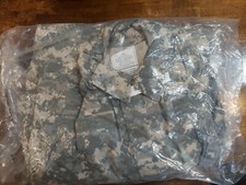 COVERALLS, MECHANICS, UNIVERS CAMOUFLA PRINT TYPE III NSN: 8415-01-534-7377 LG