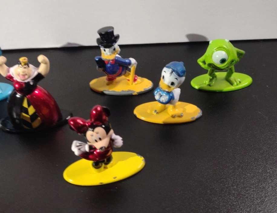 Jada Toys 16 Die Cast Mini Figuras de Metal Disney Mickey Buzz Mini Sully Peter Pan Foto 4 de 4