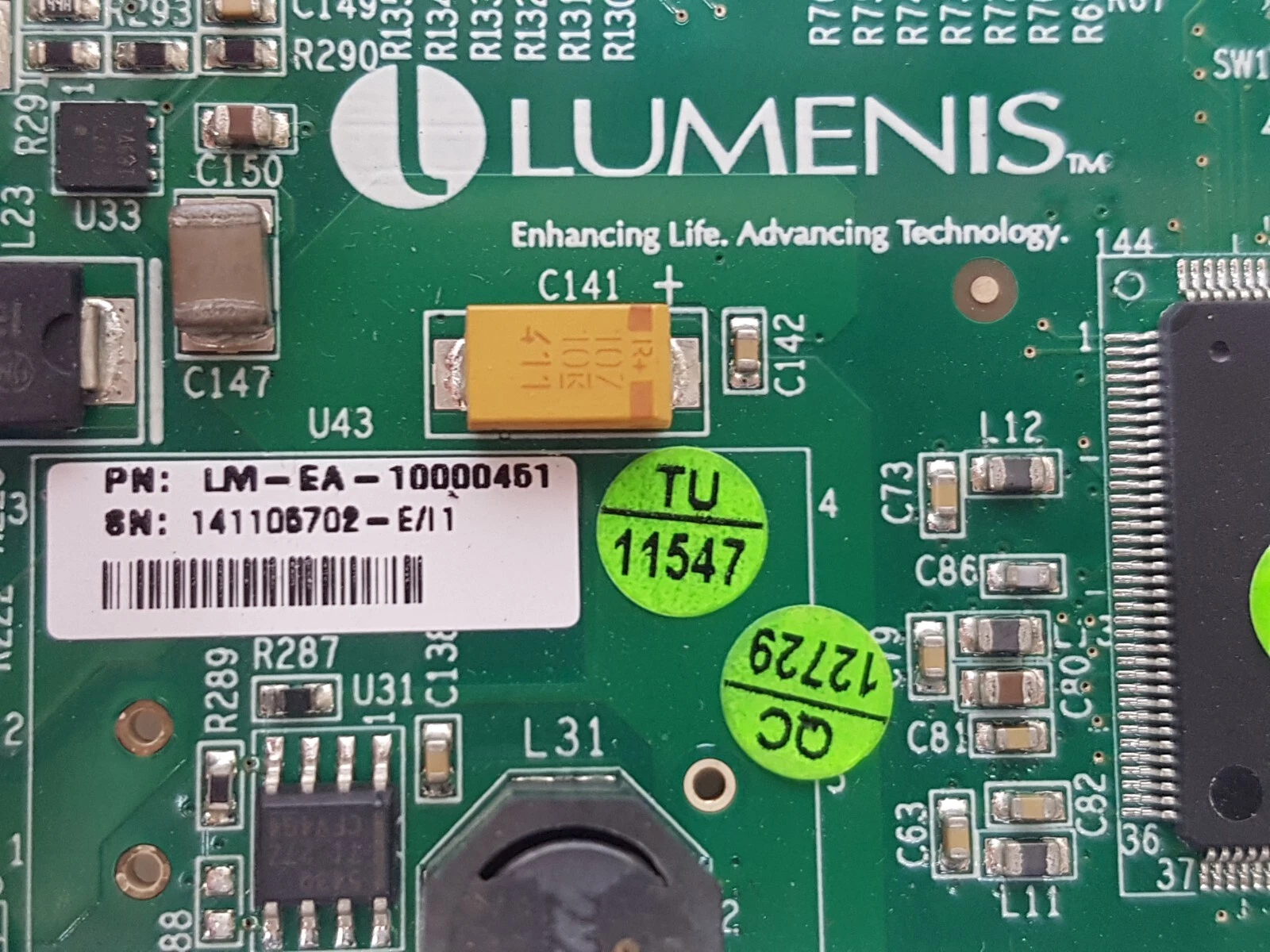 Close-up of the Lumenis logo and LM-EA-10000451 part-number label on the MMCU board