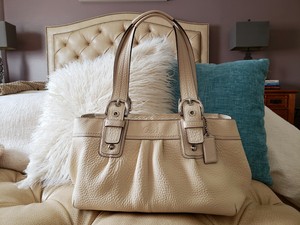 coach cream bag