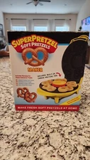 NEW IN BOX -Nostalgia Stainless Steel 2 In 1 Electric Soft Pretzel Factory Maker