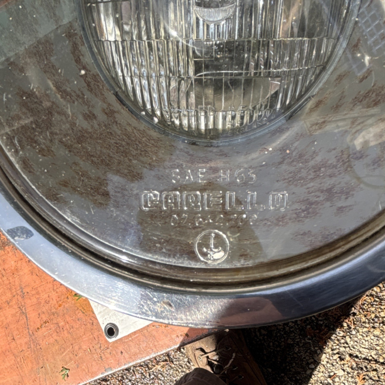 Lamborghini Miura, Carello headlight assembly.  Early Fiat 850 Spider # 9916591